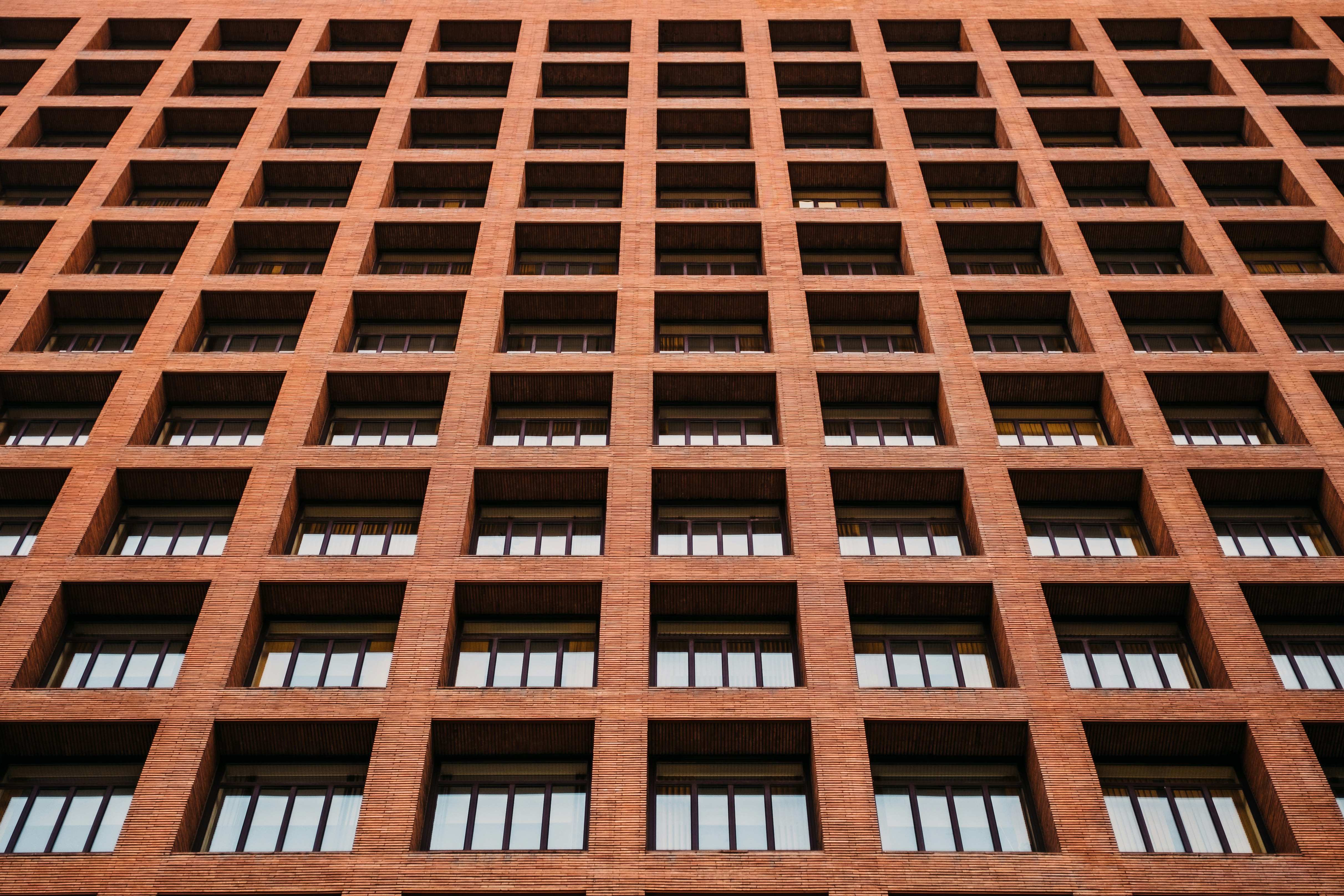 brown concrete building at daytime